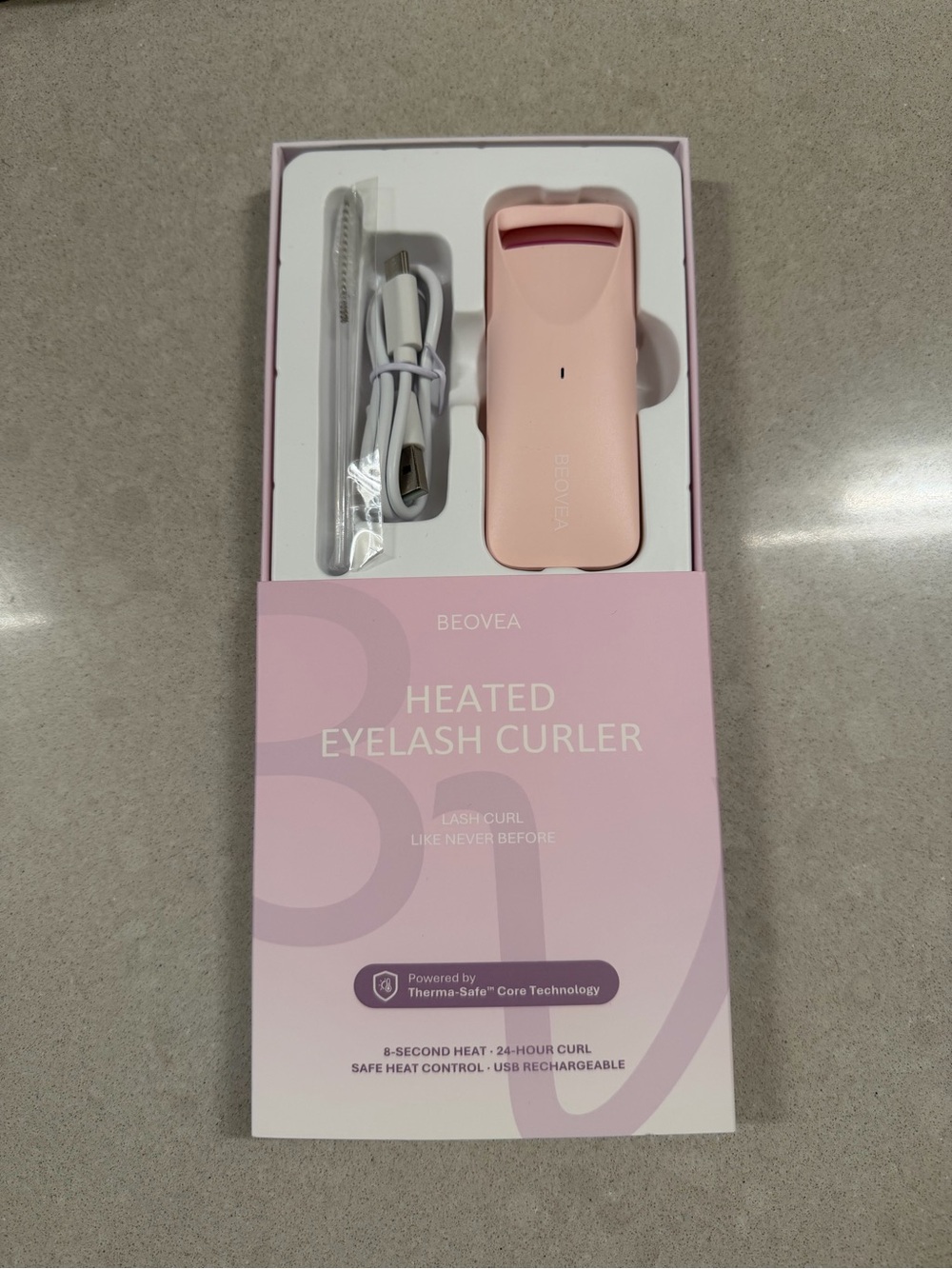 Heated eyelash curler